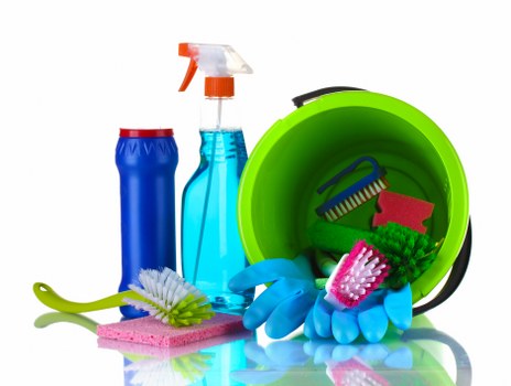 Cleaning professional applying health and safety measures