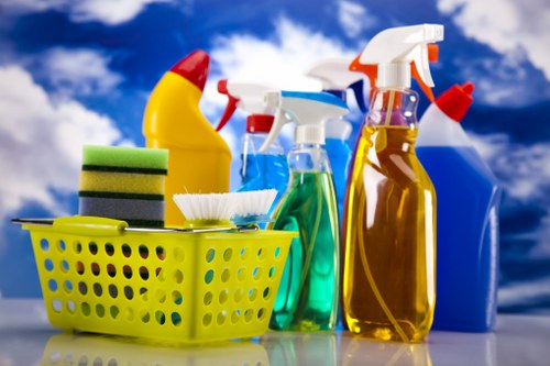 Evening commercial cleaning in a Clapham workplace with desks and floors