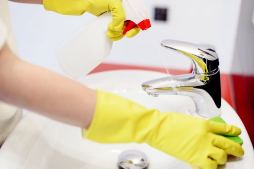 Cleaner preparing a scheduled cleaning appointment with service details