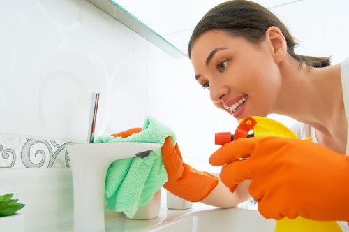 Protective cleaning PPE including gloves and apron prepared for safe use