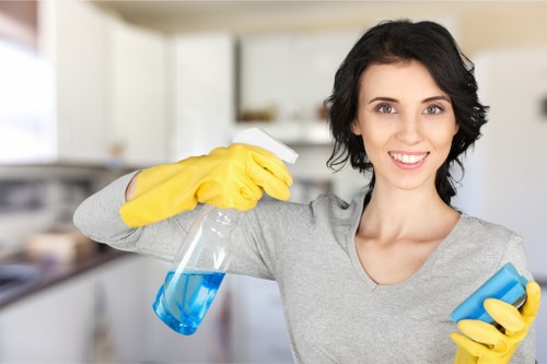 Professional cleaner reviewing service scope and property instructions