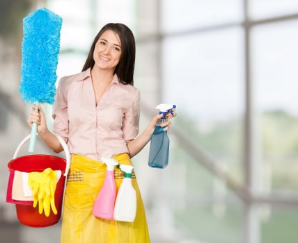 Clapham cleaner dusting shelves and refreshing a bright apartment