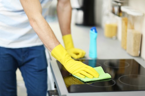 Cleaning products stored and handled safely by a professional cleaner