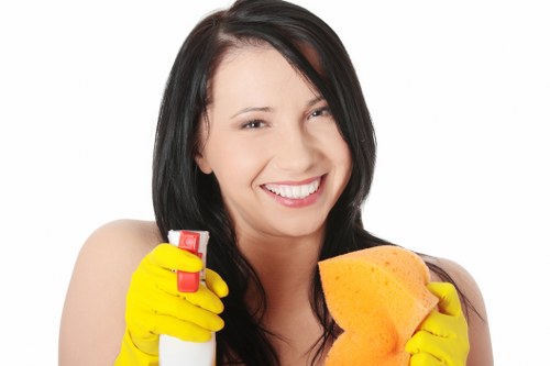 Cleaner completing a risk assessment before starting work in a property