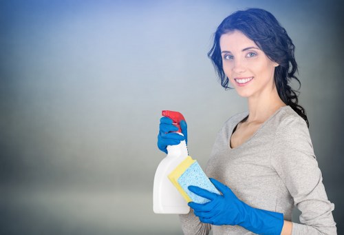 Local cleaner preparing a routine house cleaning visit in Clapham